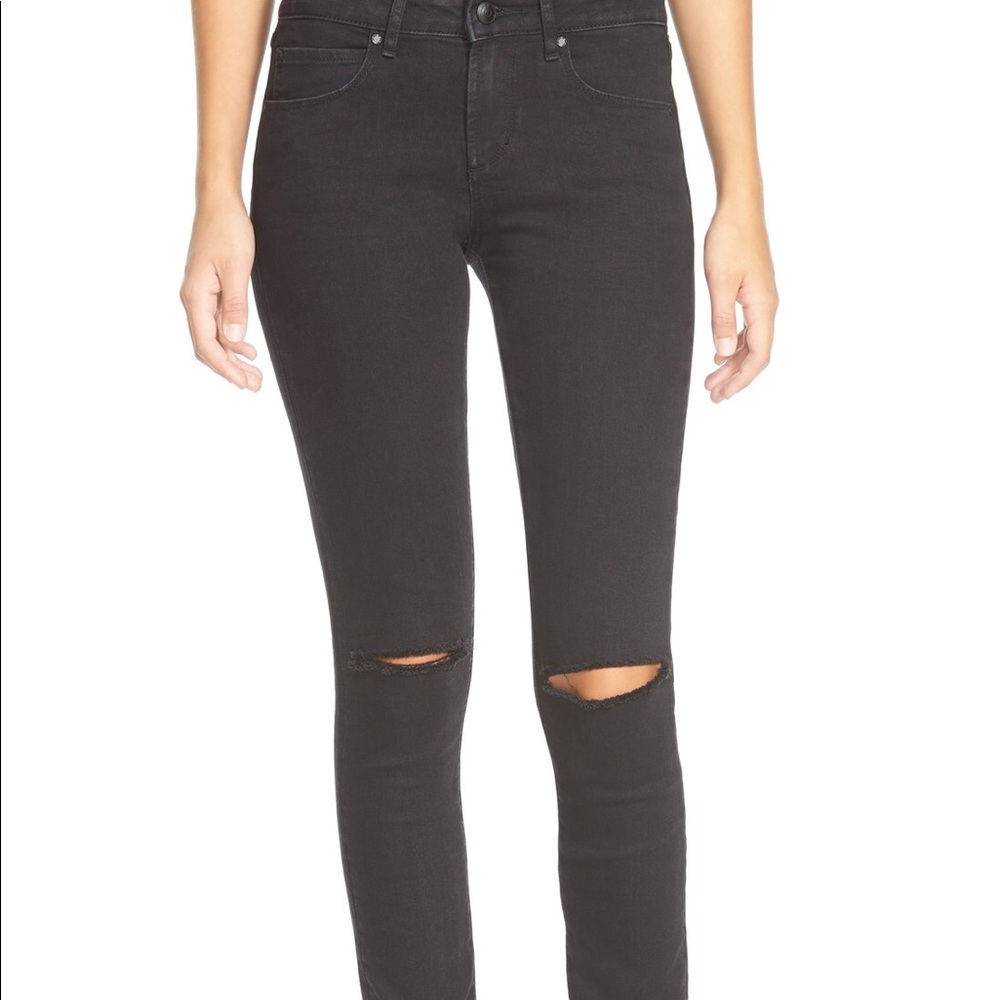 Ripped Knee Skinny Jeans